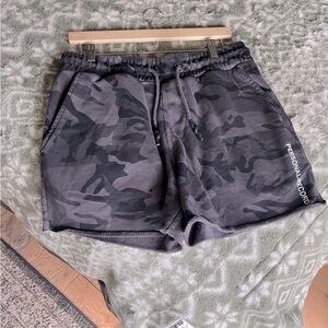 Men size XL  cut off work out shorts. Black camouflage.